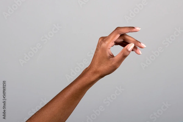 Fototapeta Crop black woman reaching out