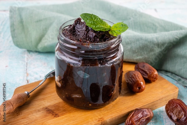 Obraz Creamy date paste, homemade in a glass jar.