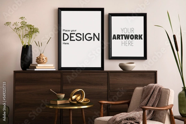 Fototapeta Iterior design of elegant apartment with poster, commode,  armchair with plaid, coffee table and personal accessories. Gray concrete wall. Mock up poster. Template.