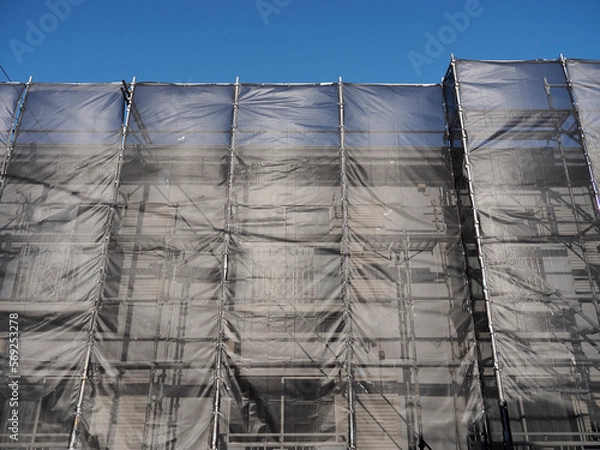 Fototapeta 集合住宅の仮囲いと足場