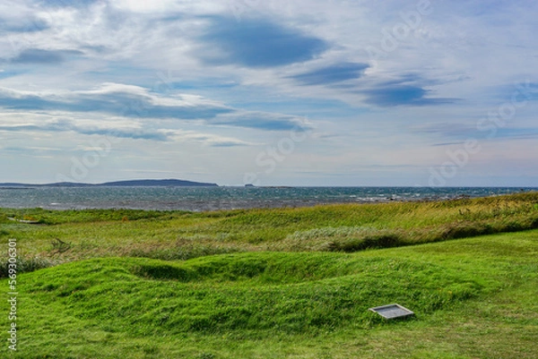 Obraz Newfoundland, Canada: A foundation marker at L’Anse-aux-Meadows (trans. Meadows Cove), the archeological site of a Norse settlement dating from 990 to 1050 CE.