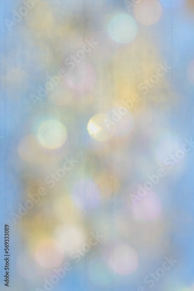 Obraz Abstract, blue, gold and pink bokeh with on blue wood grain.