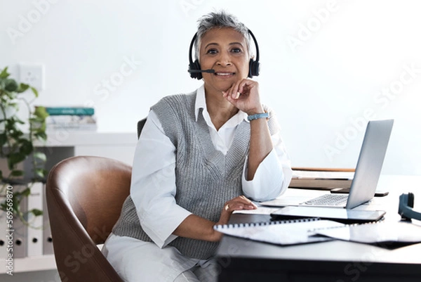 Fototapeta Call center, laptop and portrait of business woman talking for telemarketing, customer service and contact us. Trust, sales and crm with senior employee at help desk for technical support and email
