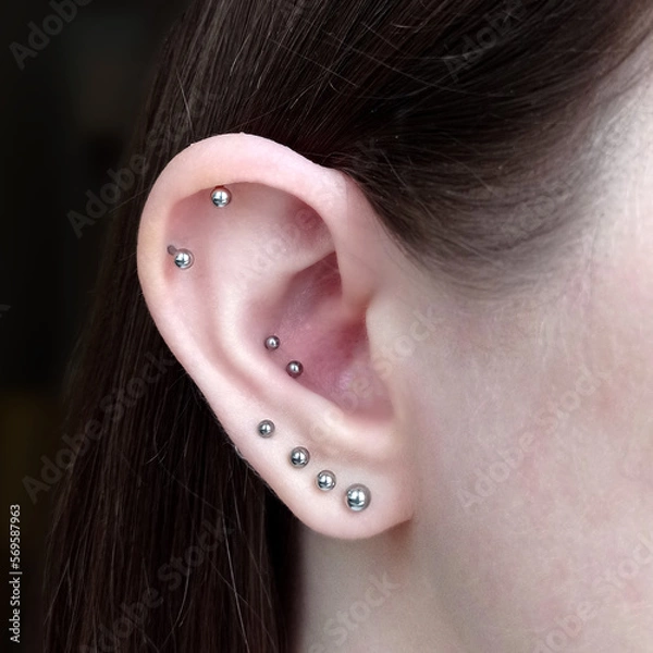 Obraz ear piercings photos.Helix piercing.Ear rings