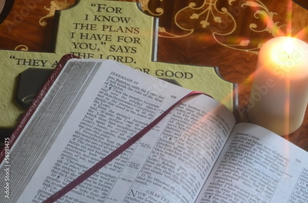 Obraz Holy bible cross by candlelight
