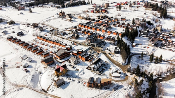 Obraz Beautiful view of the snowy city in the mountains. Snowy cold day, frosty weather season, snow, winter day