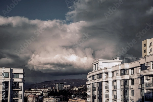 Obraz clouds over city