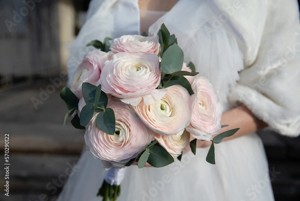 Obraz Bride's bouquet in the hands of the bride