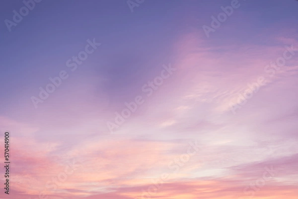 Fototapeta Sky with soft and fluffy pastel pink and blue colored clouds. Sunset background. Nature. sunrise. Instagram toned style