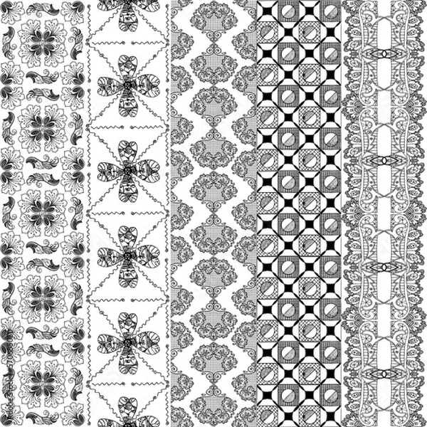 Fototapeta Monochrome abstract floral print. Vertical lase stripes on white background. Seamless pattern for wallpapers and fabric.