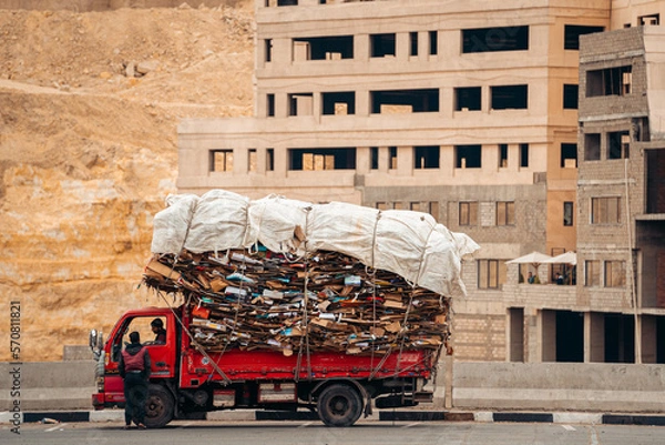 Obraz Truck Carrying Giant Load of Cardboard to Trash City Cairo Egypt