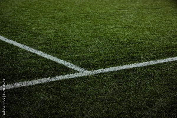 Obraz White lines on the football lawn under the spotlight