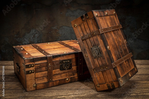 Fototapeta two retro decorative cases or storage boxes on a wooden rustic table