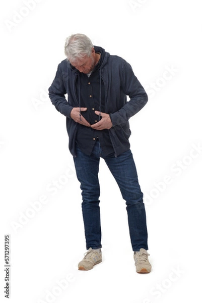 Fototapeta full length portrait of a man in stomachpain in isolated on white