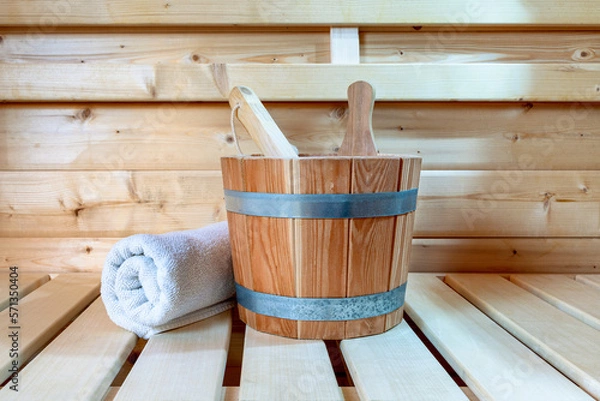Obraz Detail from buckets and white towels in a sauna, wellness accessories