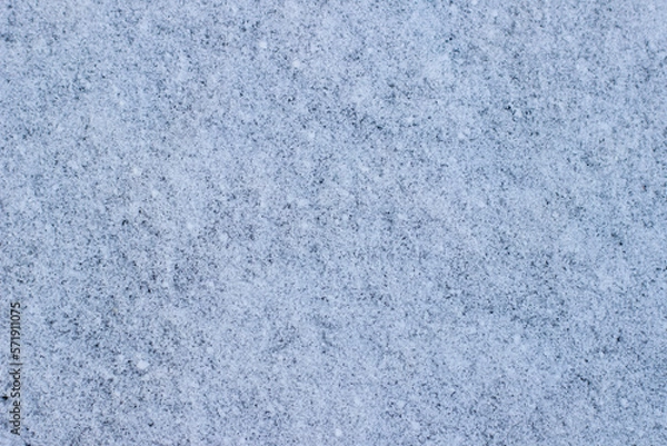 Fototapeta Frosty texture of snow, background from snow close-up. Place for text