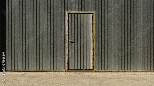 Fototapeta worn metal warehouse door background
