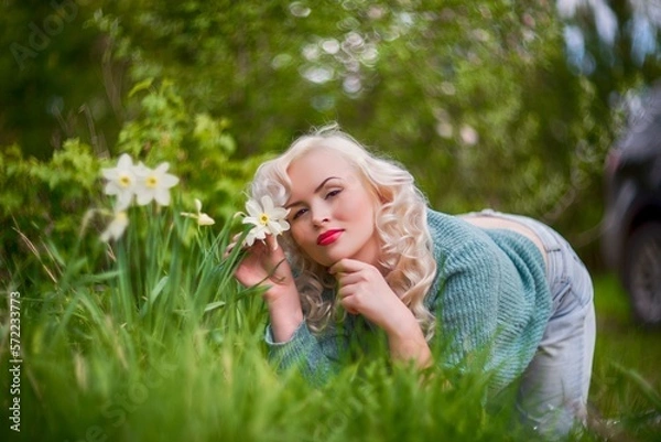 Obraz beautiful girl in the country with tulips