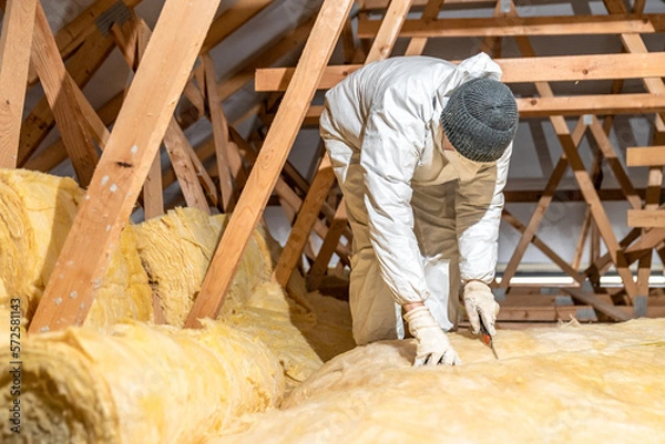 Obraz thermal insulation of roof spaces with glass wool