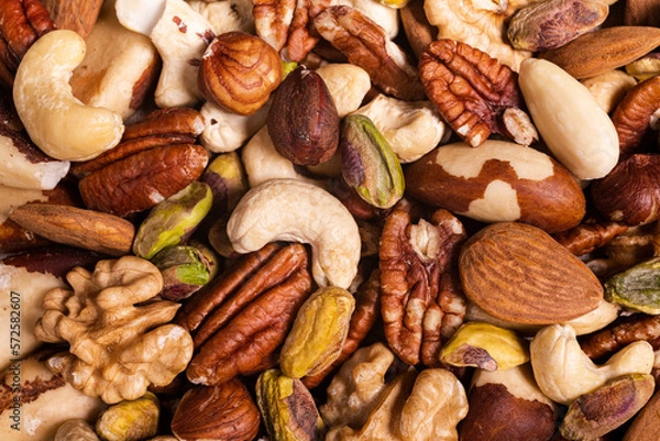 Fototapeta extreme close-up top view, a background with a large variety of shelled nuts.