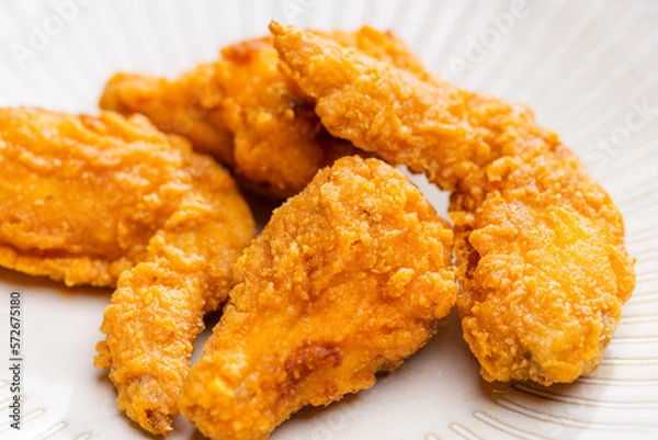 Fototapeta Crispy fried chicken drumstick dish