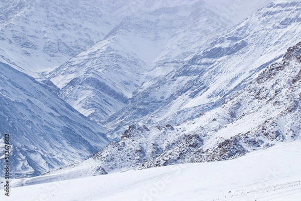 Fototapeta resort in the snow covered mountains