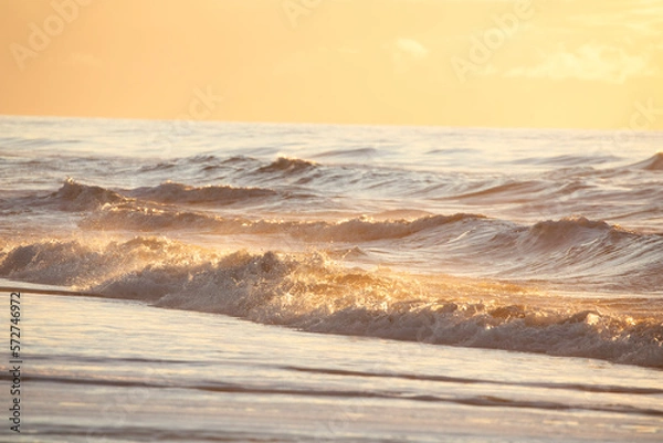 Obraz splashing waves in sunset light