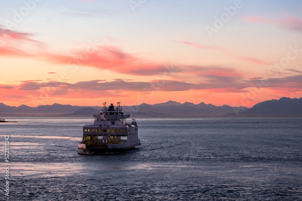 Fototapeta BC Ferry near active pass in the Gulf Islands at sunset.