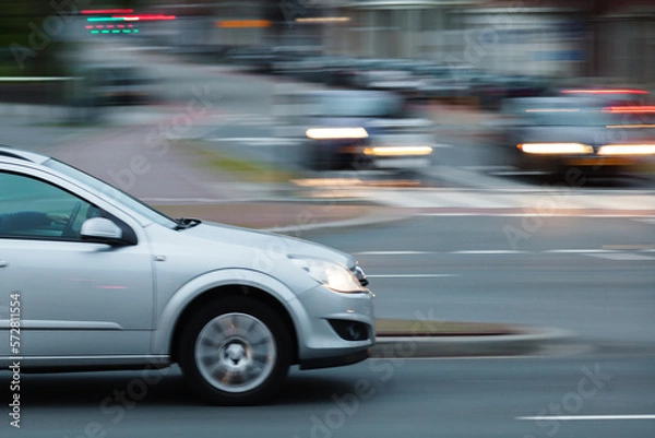Fototapeta motion blur picture of city traffic in the evening