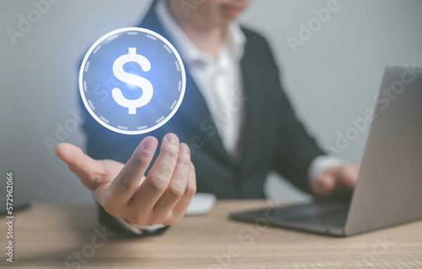 Obraz Man hand holding dollar sign.