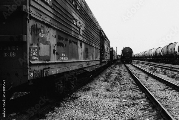 Obraz Wagons and tanks of freight trains on rails