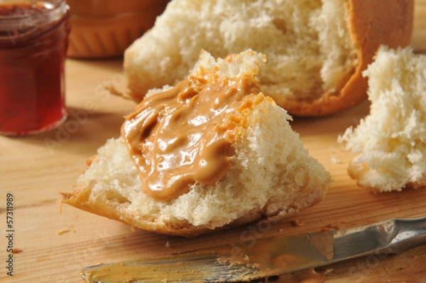 Fototapeta Peanut butter on homemade bread