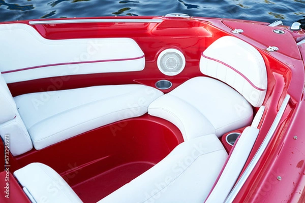 Obraz Сlose-up of the red speedboat bow with white leather seats                            
