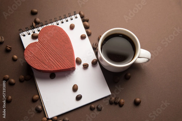 Fototapeta Notepad, red heart and coffee cup