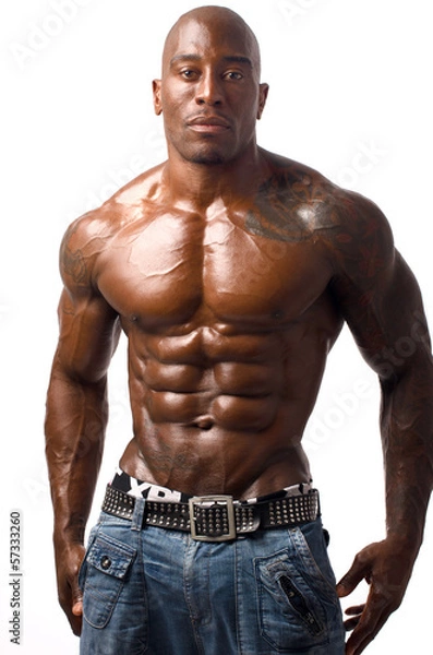 Fototapeta Strong bodybuilder man with perfect abs, chest,biceps