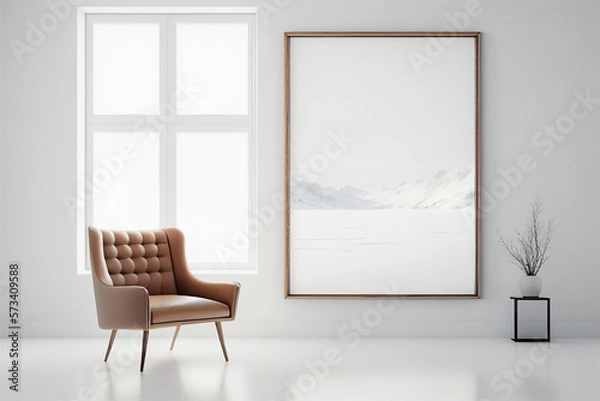 Fototapeta A tan gold frame in portrait orientation for showcasing art as a graphic resource in a bright white room with a tan leather chair modern minimalist