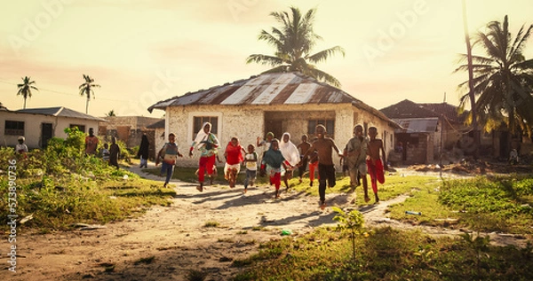 Obraz Group of African Little Children Running Towards the Camera and Laughing in Rural Village. Black Kids Full of Life and Joy Enjoying their Childhood and Playing Together. Little Faces with Big Smiles
