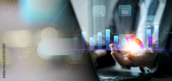 Obraz Businessman presenting a sustainable development concept, growth, profit, success chart Business man showing growth planning, opportunity, challenge and business strategy graphs and target.