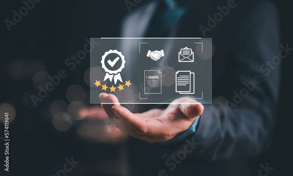 Fototapeta Hand shows sign of top service Quality assurance, Guarantee, Standards, ISO certification and standardization concept, satisfaction, service experience, show the standards of products and services.