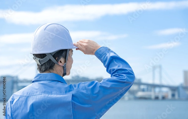 Fototapeta 建築・男性・青空