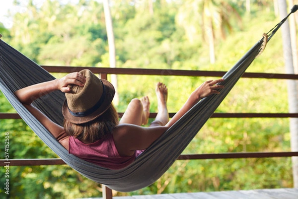 Obraz Woman relaxing in hammock in vacation. Woman relaxing in hammock in vacation on tropical island in Thailand.