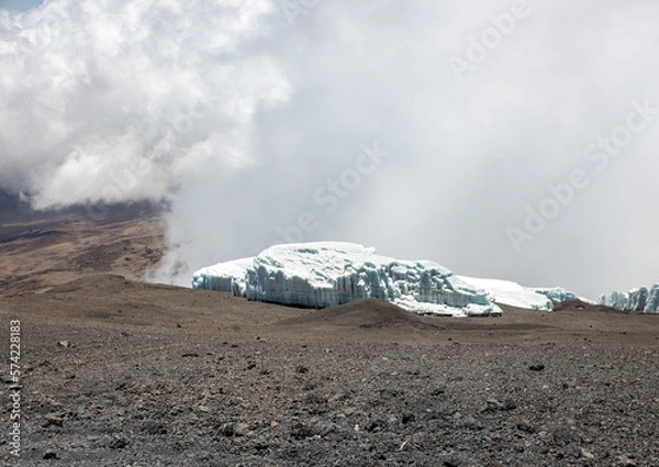 Fototapeta Melting Ice and Dry Soil