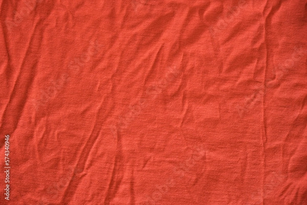 Fototapeta Red crumpled textile material. Texture or background.