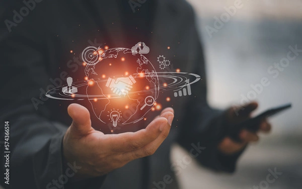 Obraz Hand holding virtual Global Internet connection metaverse. Business global internet connection application technology and digital marketing, Financial and banking, Digital link tech, big data.