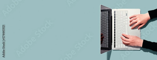 Obraz Person using a laptop computer from above