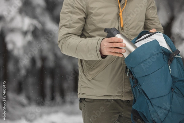 Obraz Man in the snowy forest