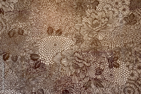 Fototapeta Katagami is traditional Japanese craft of making paper stencils for dyeing for example kimono textiles. Layers of thin washi paper are bonded with a glue extracted from persimmon. Beautiful artworks.