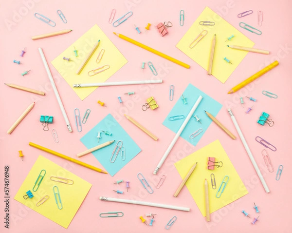 Fototapeta stationery items for girls or women on light pink background. Back to school. Female Student's, pupil's or engineer's supplies. Office objects on pastel pink background. Calculator, keyboard