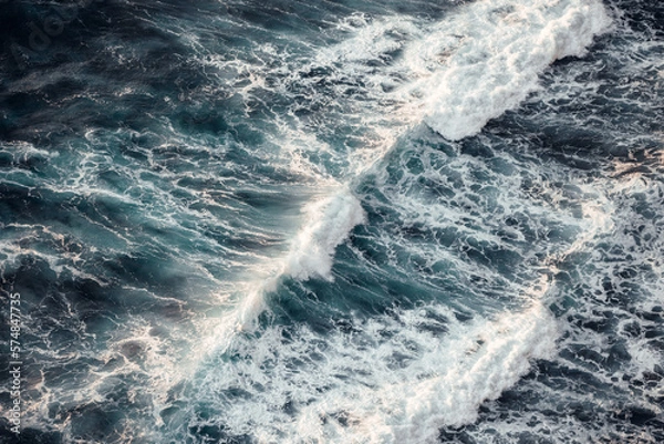 Obraz Powerful ocean waves rushing to meet the coastline.
