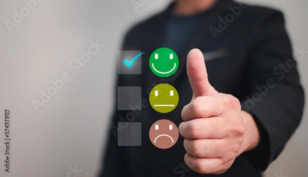 Fototapeta review or survey from customer is important for evaluate organization or company performance, business man ranking excellent with smiley face